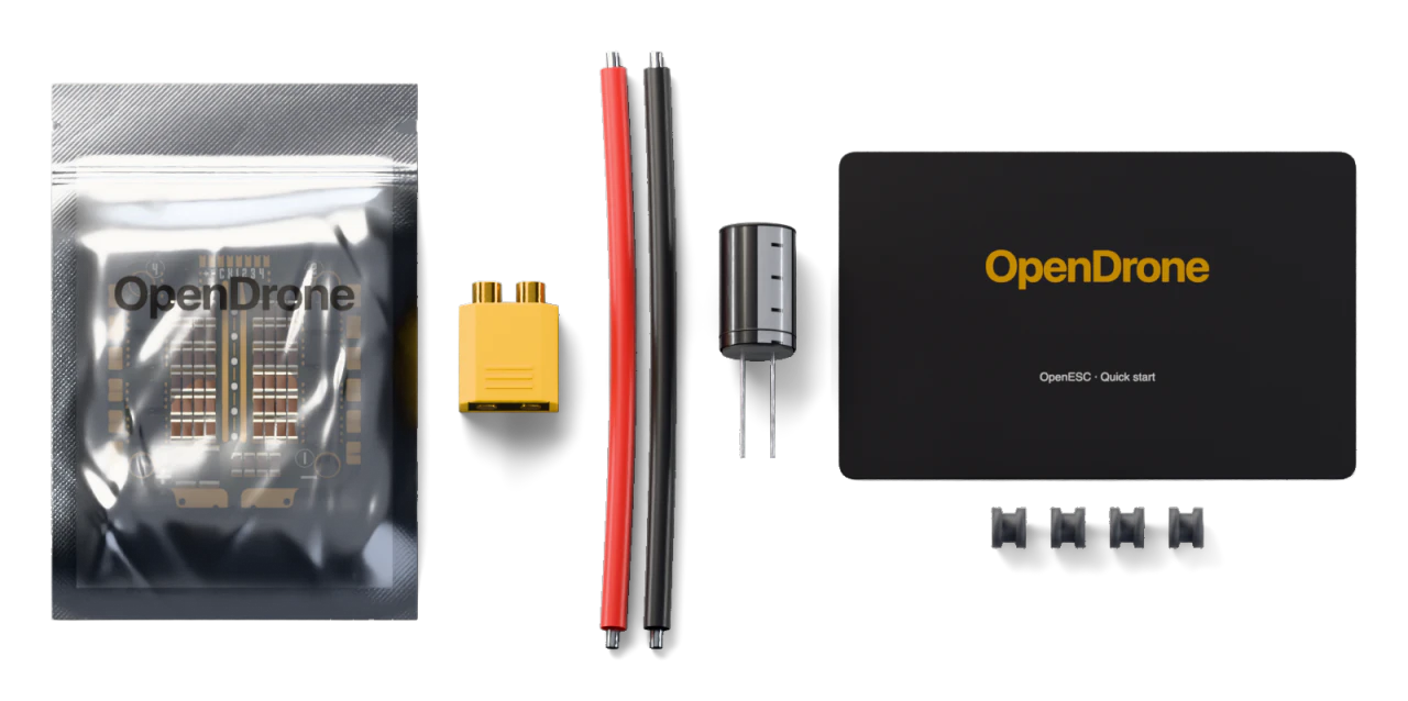 1× OpenESC board, 1× XT60 battery connector, ESC-side half, 2× Silicone power wire, 12 AWG, 100 mm, red and black, 1× Low-ESR electrolytic capacitor, 470 µF 50 V, 4× Silicone soft-mount grommets, M3, 1× Quick-start card, 1× ESD bag
