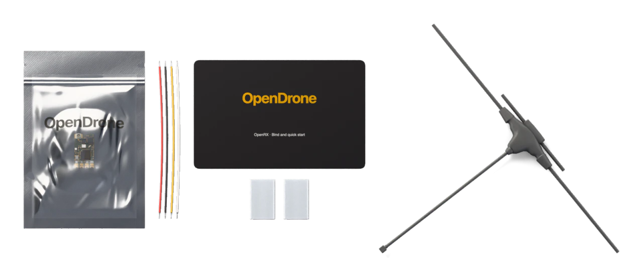 1× OpenRX board, 1× Silicone hook-up wire set, 30 AWG, four wires, 1× Heat-shrink sleeve, clear, two-piece, 1× 2.4 GHz + 900 MHz U.FL T-dipole antenna, 1× Bind and quick-start card, 1× ESD bag